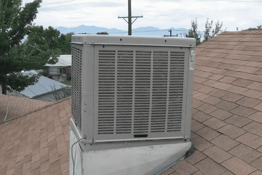 Rooftop evaporative swamp cooler on a Greeley home